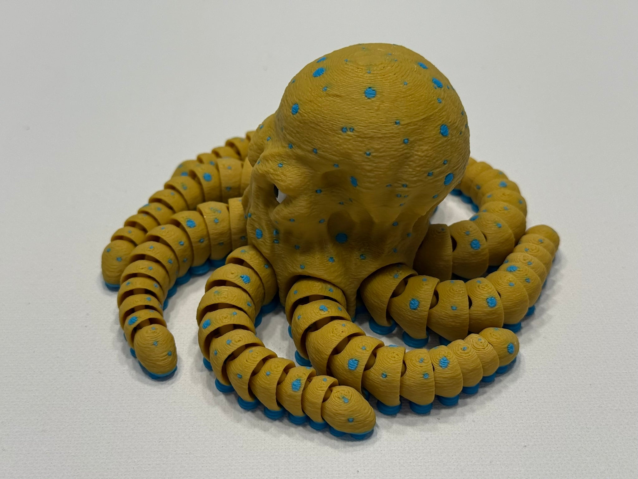 3D Printed Articulated Blue Ringed Octopus Display Model With Poseable Arms And Realistic Detail by Pencil Short Designs LLC